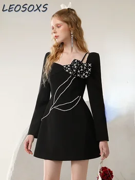 2023 Зимен нов модерен стил дизайн смисъл отслабване жени рокля тежка индустрия горещо пробиване пъпка секси женски вечерни рокли